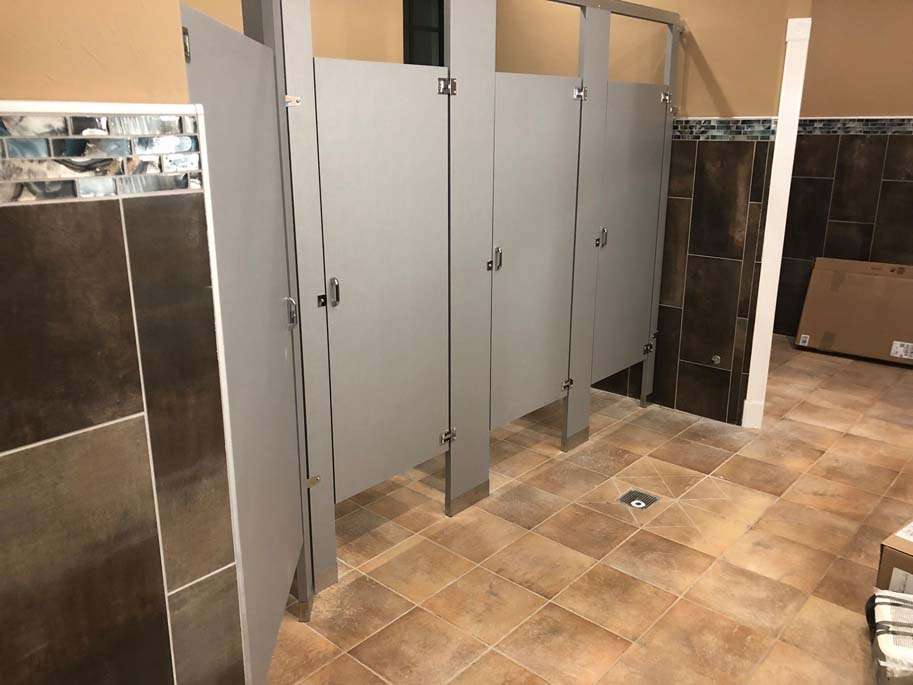 group of bathroom partitions