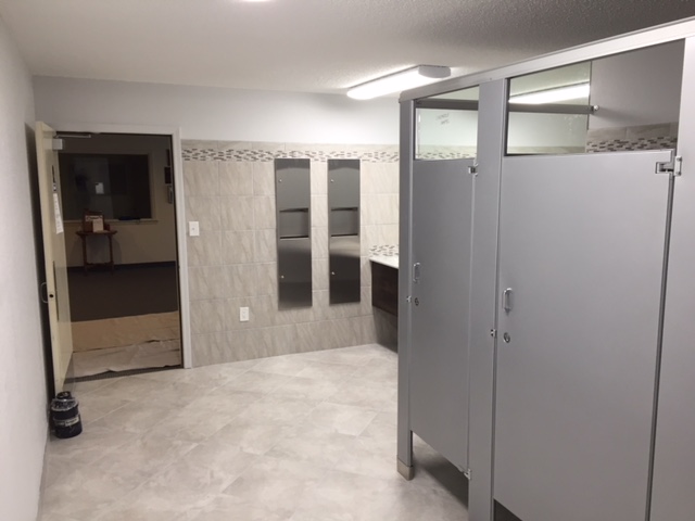 Gray restroom partitions