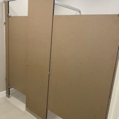 Thumbnail of http://Matte%20tan%20bathroom%20stall%20design%20and%20installation